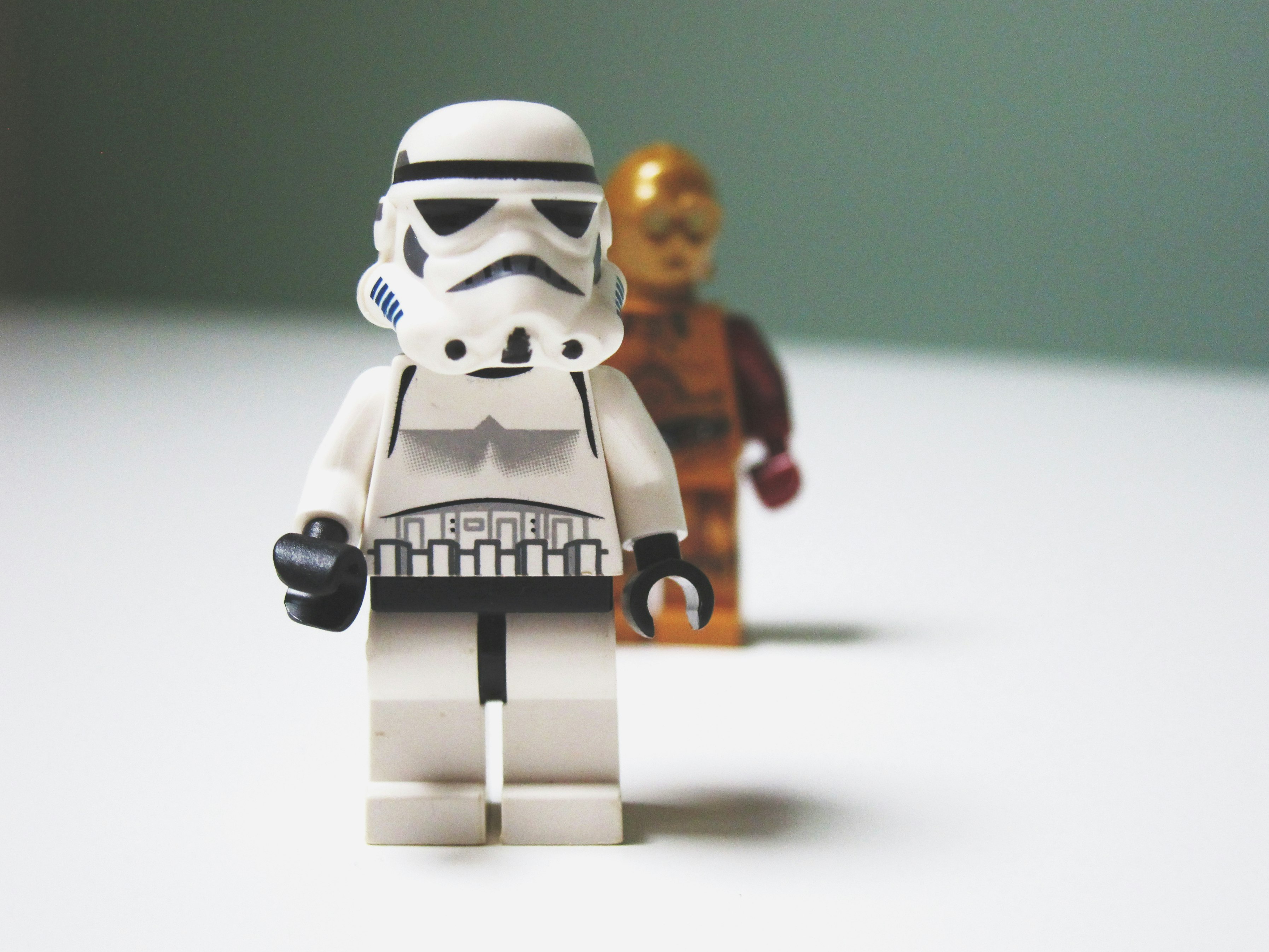 Lego Star Wars C3-P0 behind Stormtrooper toys